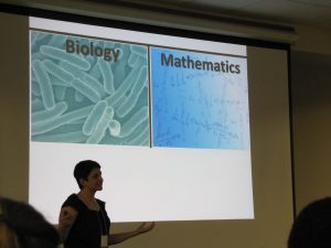Dr. Judy Day delivering her featured presentation on "Working @ the Interface: The Challenges and Opportunities of Mathematical Biology"